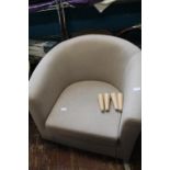 A suede effect tub chair, Postage unavailable