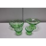 A selection of vintage green glass wares