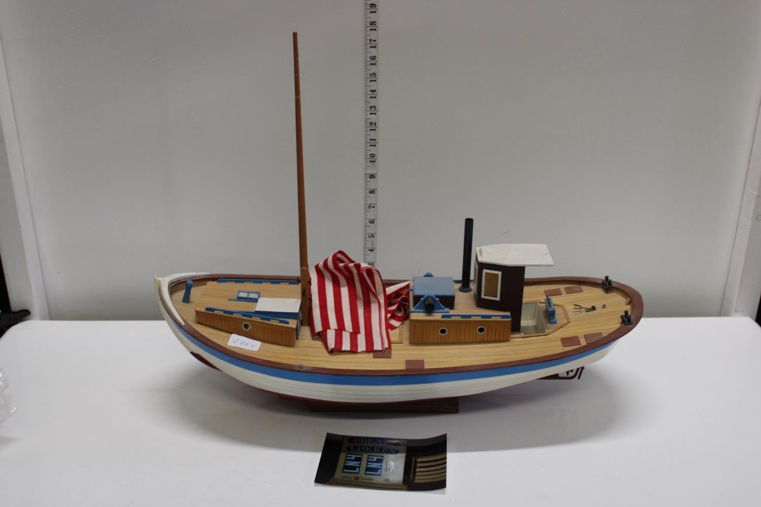 A wooden hand built boat model