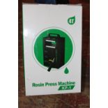 A boxed Rosin press machine