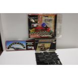 A selection of vintage Scalextric accessories