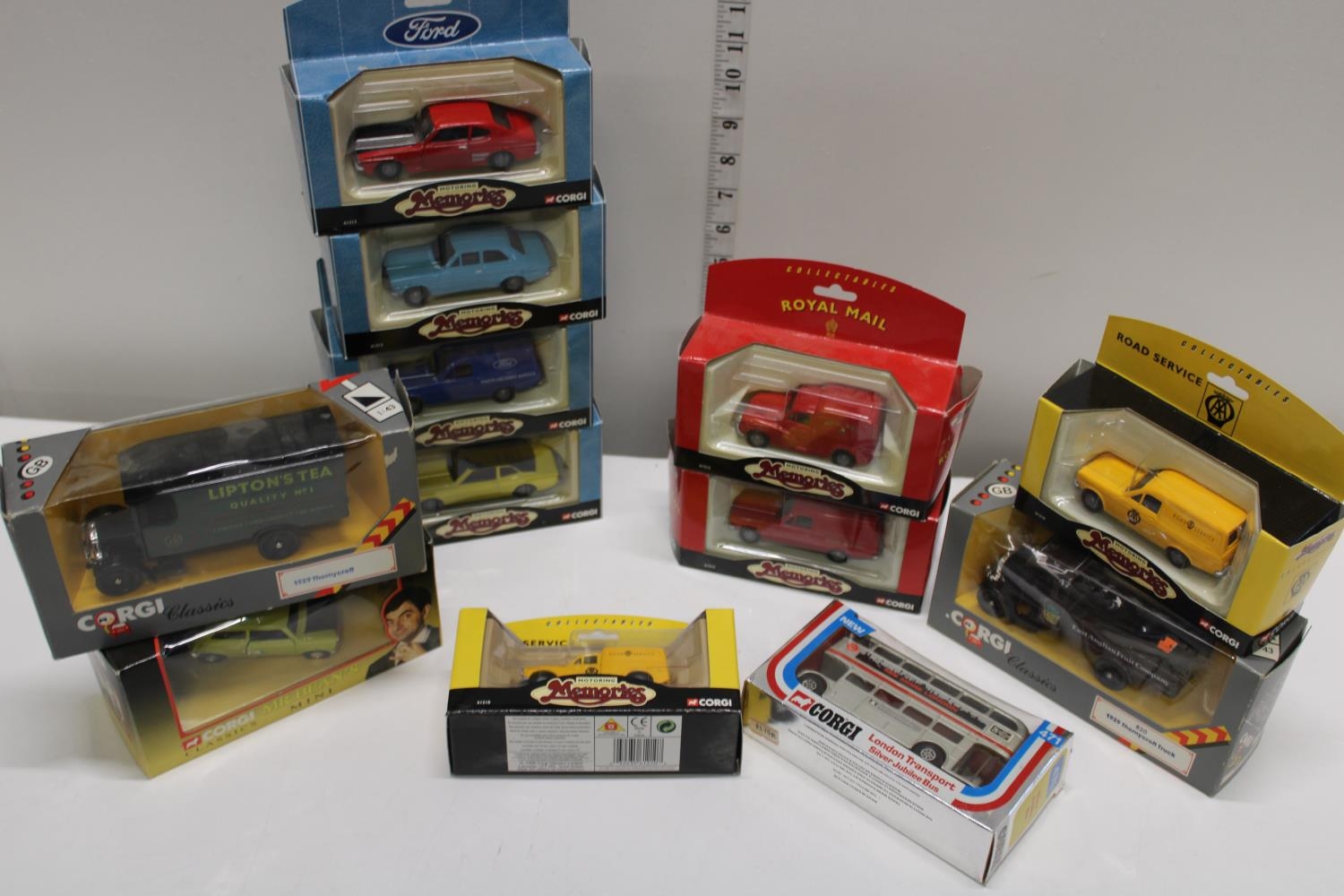 Twelve assorted boxed Corgi die-cast models