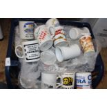 A job lot of assorted advertising mugs