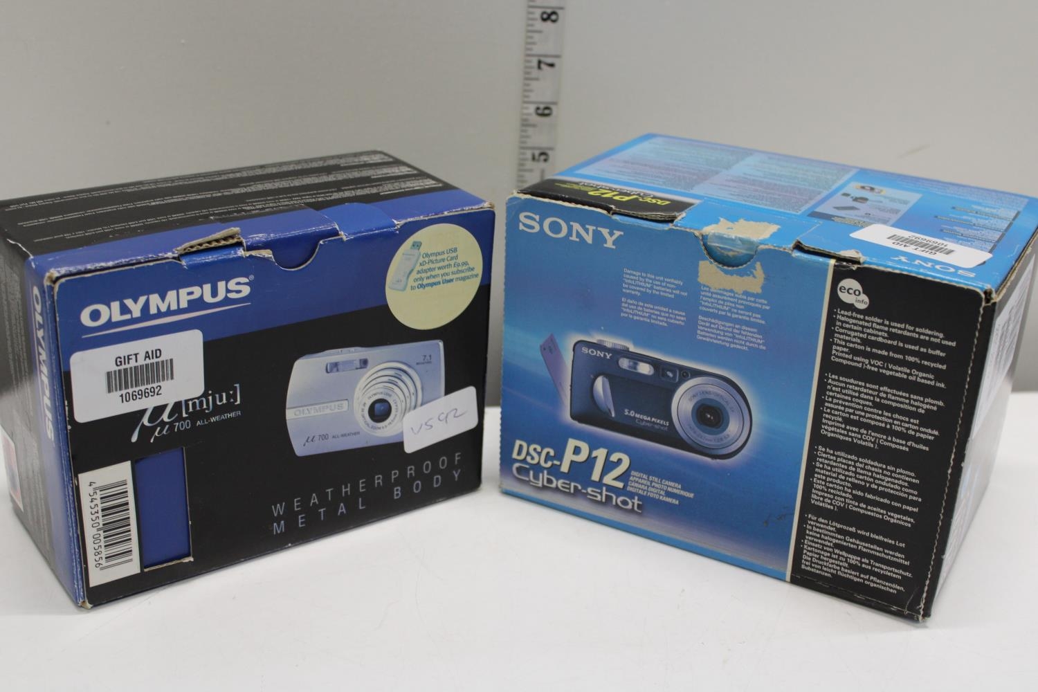 Two boxed cameras