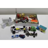 A box of assorted Matchbox & other die-cast models