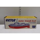 A boxed Sutcliffe clockwork boat model