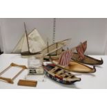 A box of wooden boat models