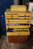 A large wooden cabinet full of vintage Meccano parts etc postage unavailable