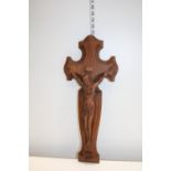 A vintage carved oak crucifix