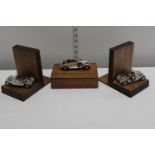 A pair of Lesney car model bookends & wooden box