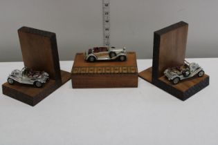 A pair of Lesney car model bookends & wooden box