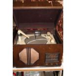 A vintage wooden housed gramophone for restoration