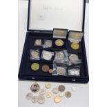 A coin box & contents of coins