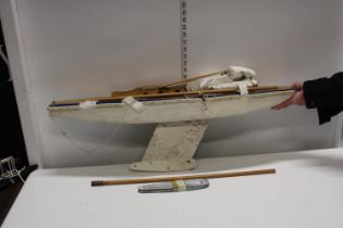 A vintage wooden boat model