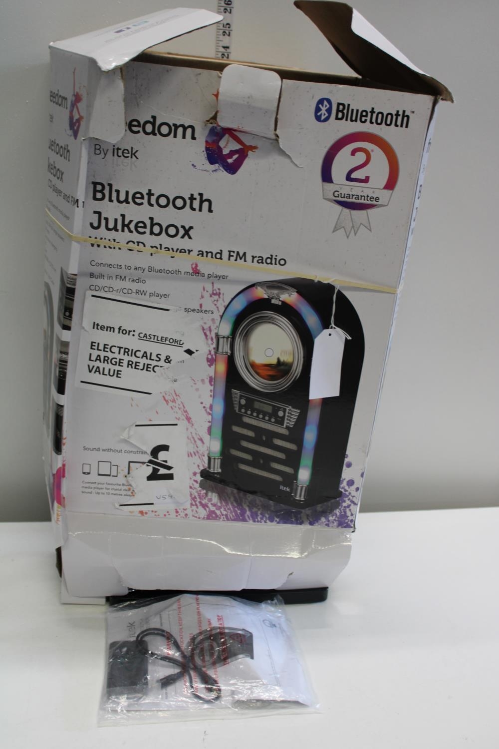 A boxed blue tooth jukebox