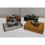 Four Lesney car models in the form of boxes
