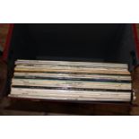A vintage LP carrying case & records
