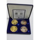 A cased gold & silver plated coin set