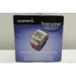 A boxed Garmin watch