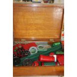 A wooden box full of assorted Meccano parts etc