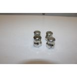 Four vintage silver salt & pepper pots