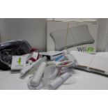 Two Wii boards and accessories