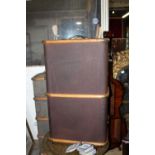 A vintage brown steamer trunk collection only