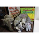 A box of assorted plush toy elephants