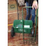 A drop spreader & other gardening items collection only