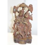 A heavy cast Oriental figural group