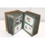 A vintage postcard album with Victorian & Edwardian examples
