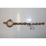 A Ladies vintage 9ct gold watch. For scrap. Gross weight 22 grams.