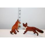 Two vintage Beswick fox figures
