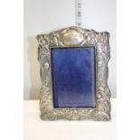 A silver picture frame in the Art Nouveau style hallmarked for Birmingham 1902