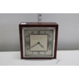 A vintage wooden cased & chromed mantle clock in GWO