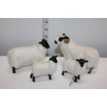A selection of Beswick sheep figurines