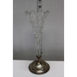 A hallmarked silver based glass posy holder. Hallmarked for Birmingham 1902