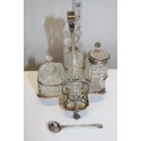 A Victorian hallmarked silver cruet set (missing one bottle) hallmarked for London 1889