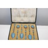 A set of Norwegian silver and enamel coffee spoons in a Liberty & Co presentation case. (one spoon