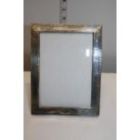 A hallmarked silver picture frame hallmarked for Birmingham 1906.