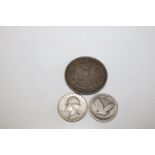 A 1894 Morgan Dollar & two silver quarter dollars