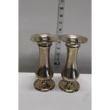 A pair of hallmarked silver posy vases. Hallmarked for Birmingham 1923. gross weight 377gms. 17cm