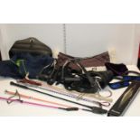 A box full of horse riding related items
