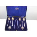 A set of six silver tea spoons & tongs, hallmarked for Sheffield 1951