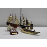 A selection of horn items & model boats etc