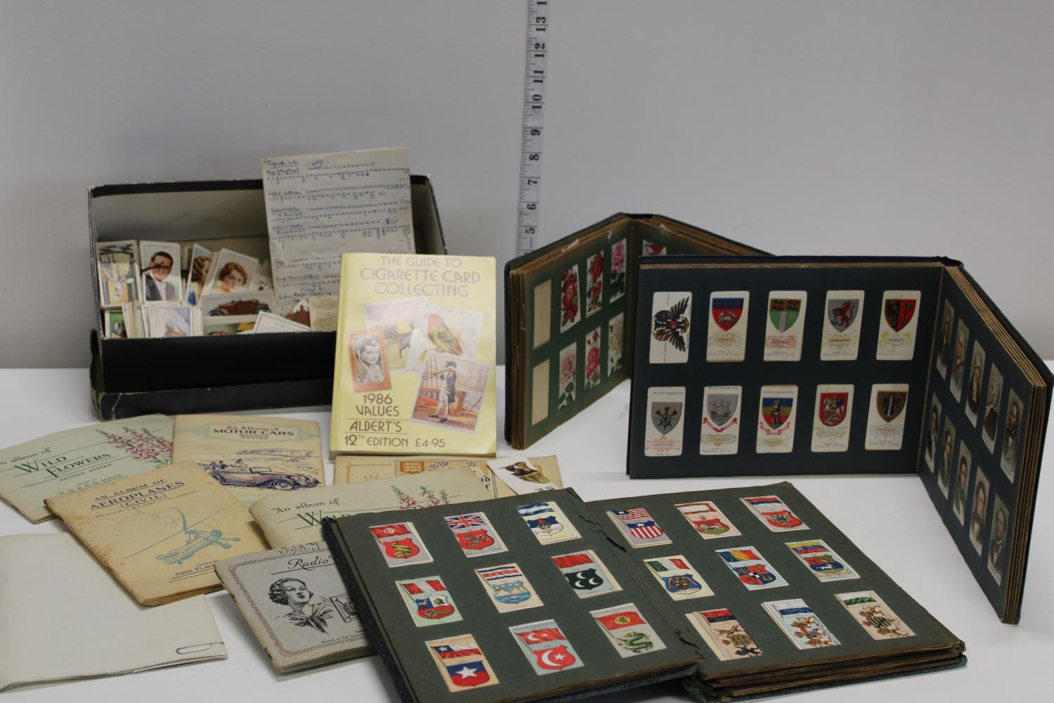 A selection of vintage cigarette card albums