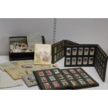 A selection of vintage cigarette card albums