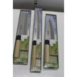 Three boxed new Japanese kitchen knives