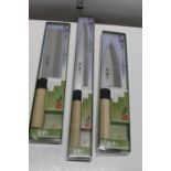 Three boxed new Japanese kitchen knives