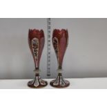 A pair of 19th Century Bohemian cranberry glass and overlay pedestal flared vases. c1870